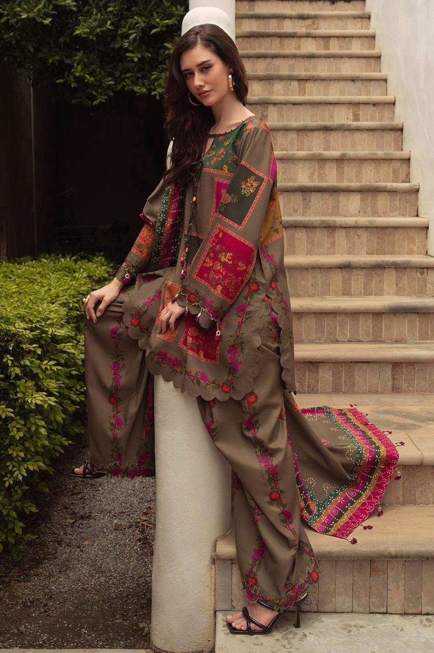 Woman in traditional embroidered outfit standing on steps outdoors
