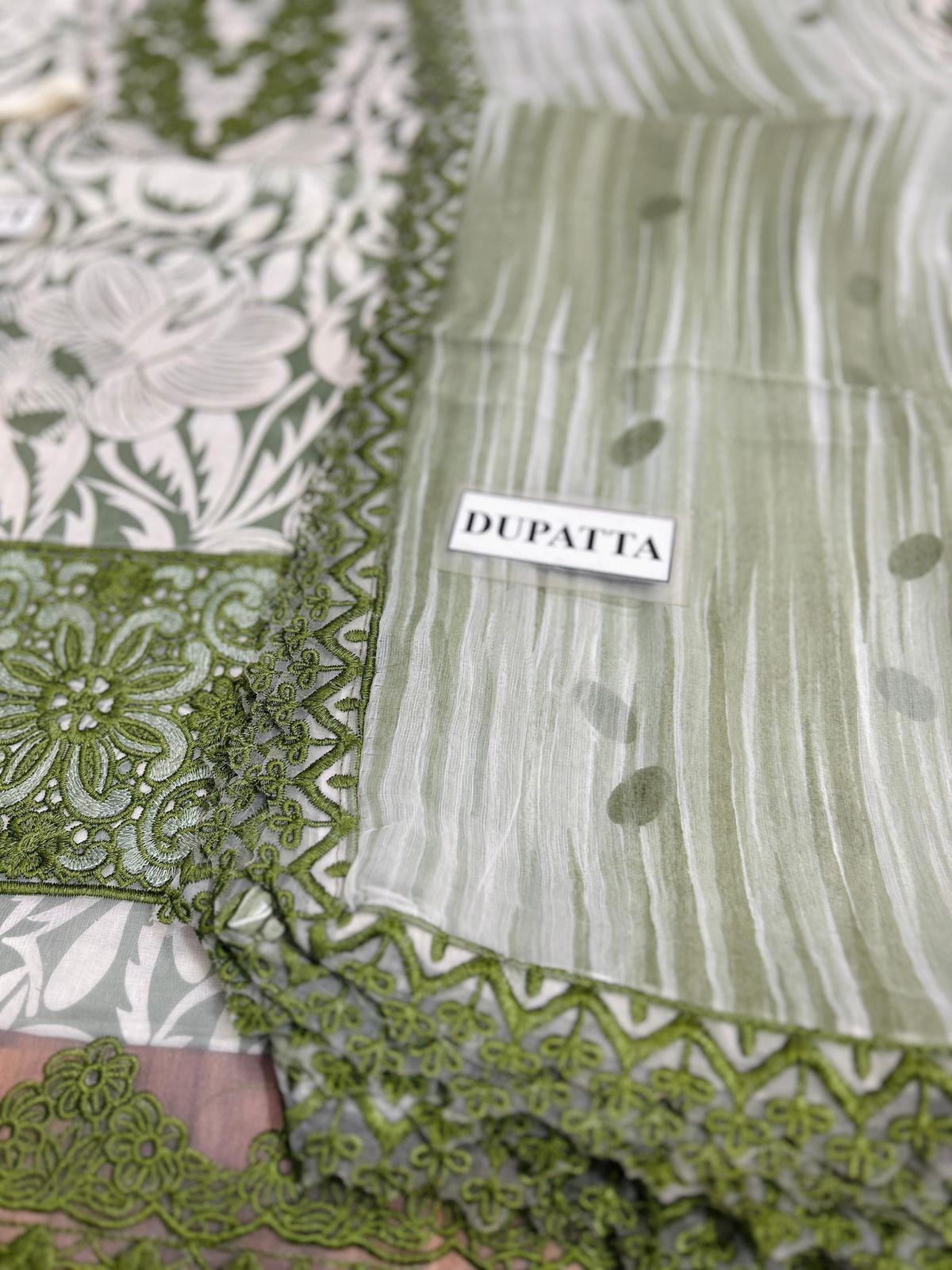 Green and white dupatta with intricate patterns and a visible brand label.