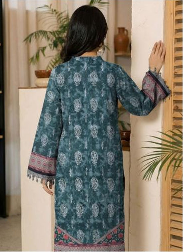 Woman wearing a floral printed shirt and trouser set from Ripple Collection with product details.