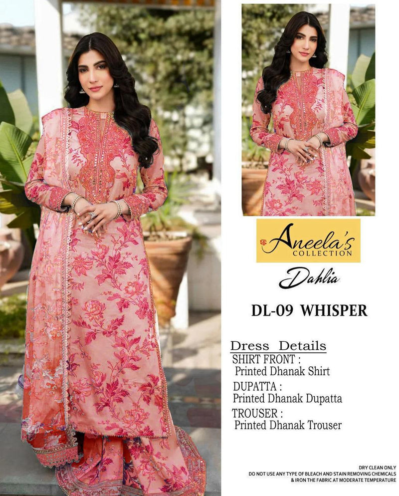Woman wearing a pink floral dress with Aneela's Collection branding.
