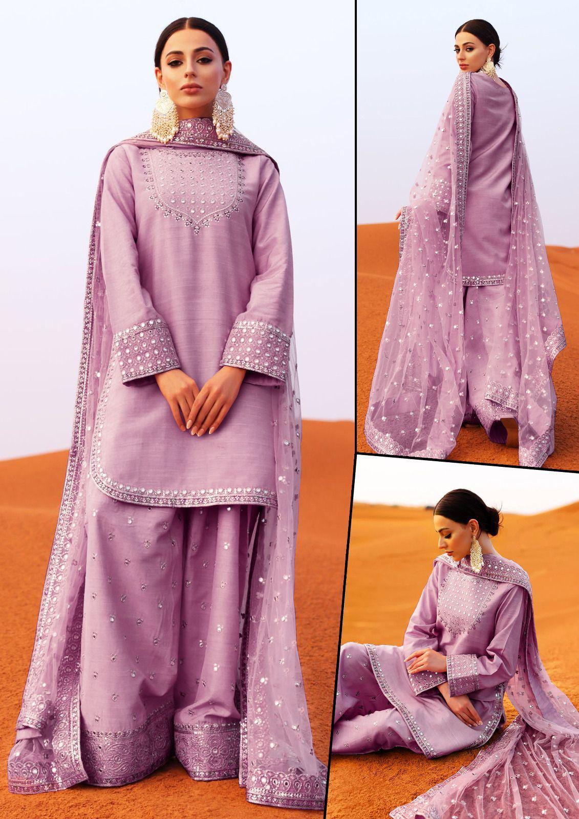 Lavender traditional outfit with matching dupatta on a plain background