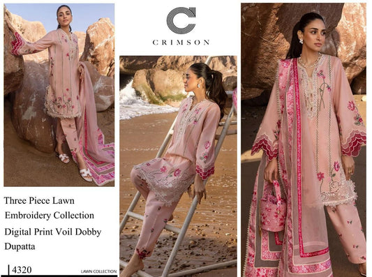 Woman in a pink embroidered outfit with a dupatta on a beach, featuring Crimson brand.