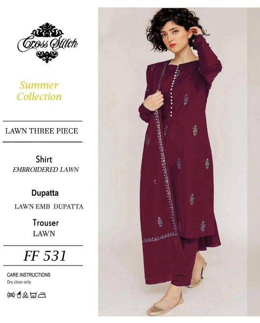 Woman wearing a maroon embroidered outfit with 'Cross Stitch' branding on a white background.