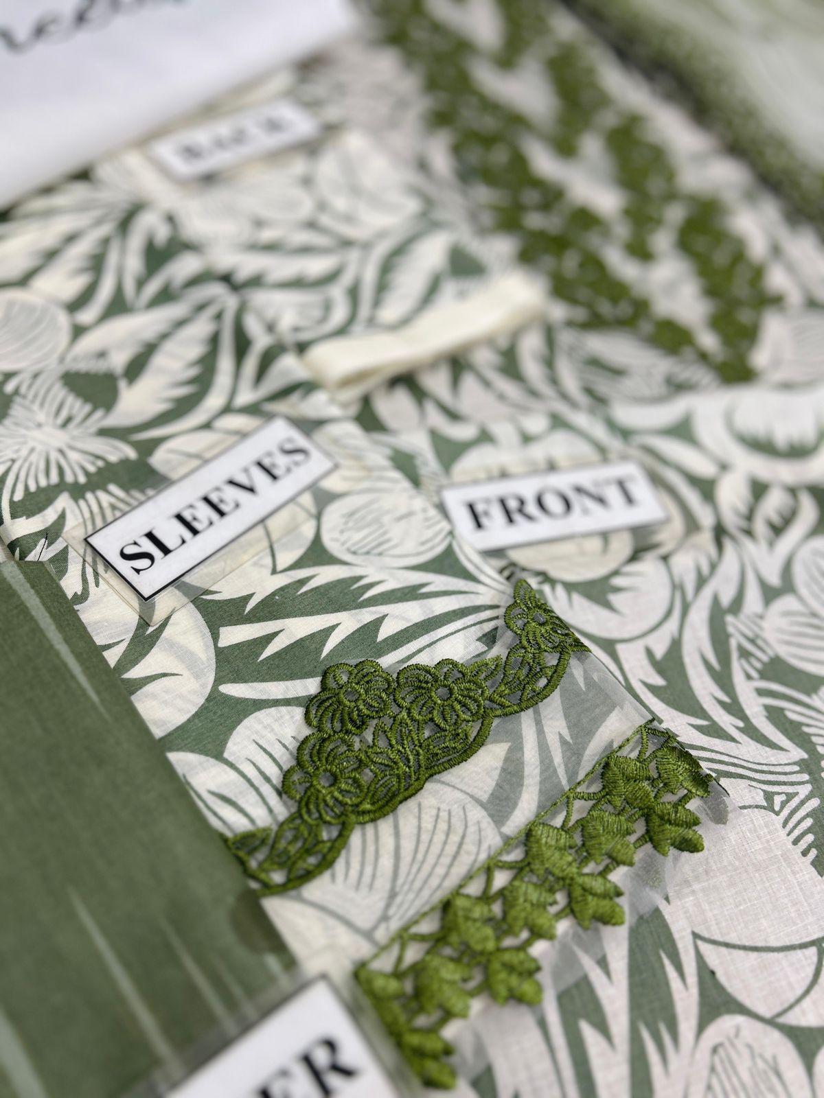 Patterned fabric with labels indicating 'SLEEVES' and 'FRONT', featuring green and white design.