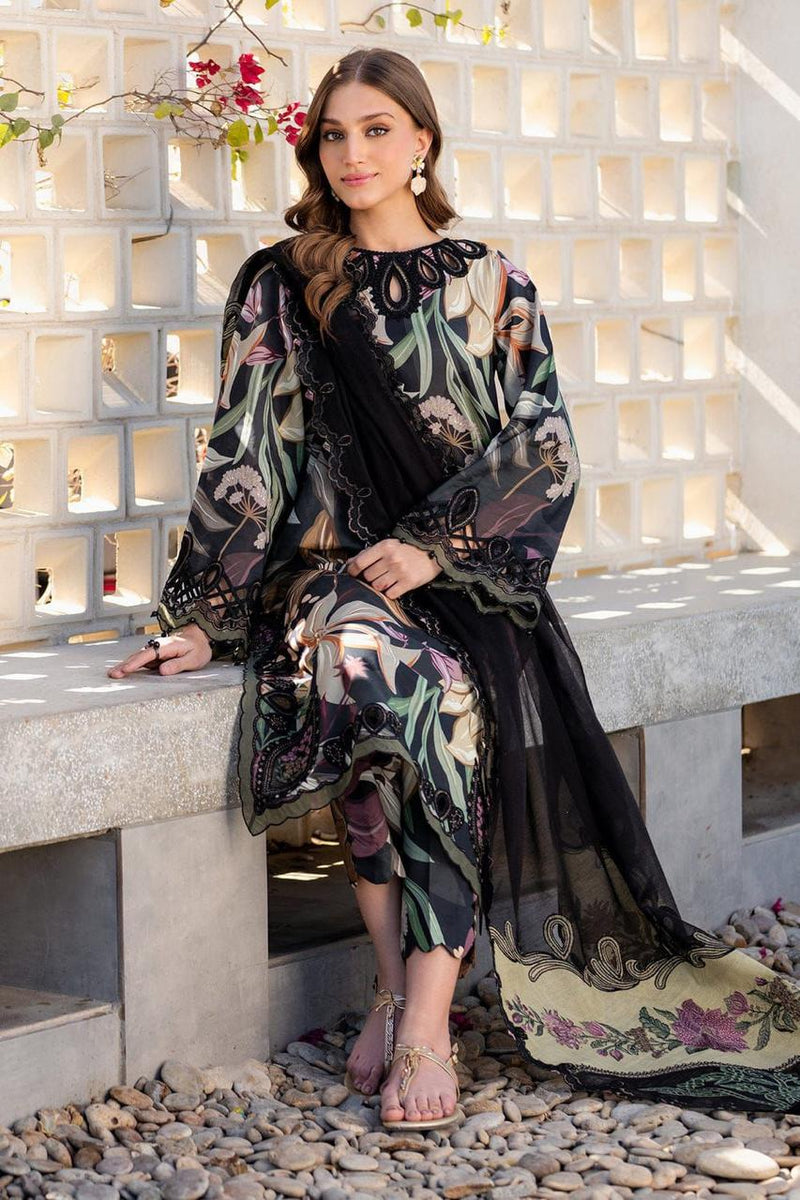 Woman in a floral dress sitting on a stone bench with a white brick wall background