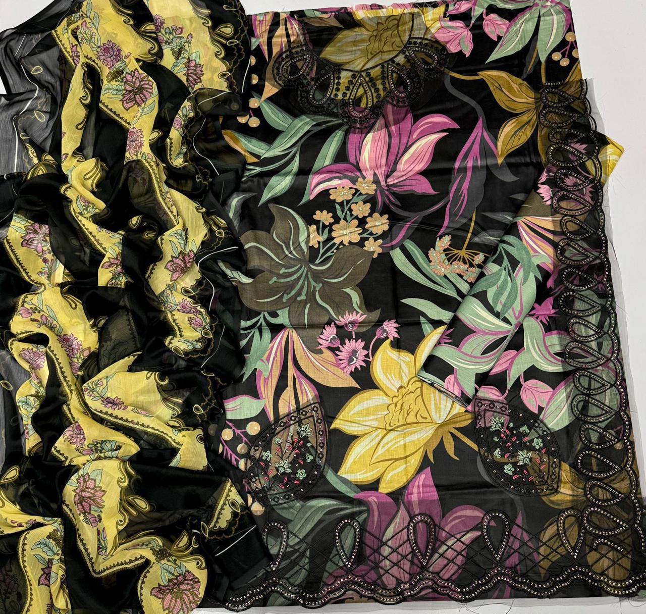 Colorful floral patterned fabric with black background