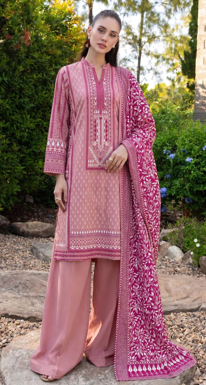 A model wearing a three-piece printed lawn suit in dusty pink and magenta with intricate embroidery, shown alongside product details on a white sidebar. The brand is GulAhmed, and the collection is Earth Crust Summer Collection.